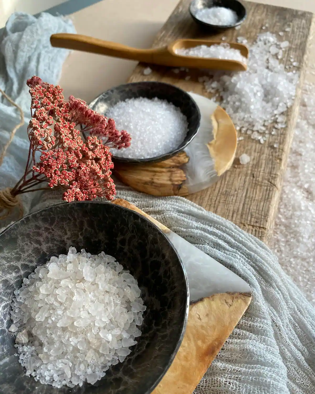 Salt and dried flowers in a bowl
